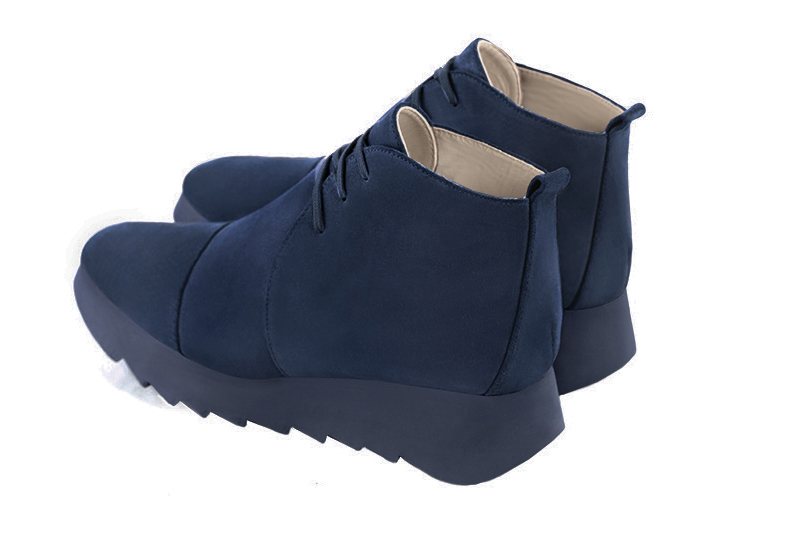 Navy blue women's ankle boots with laces at the front. Square toe. Low rubber soles. Rear view - Florence KOOIJMAN